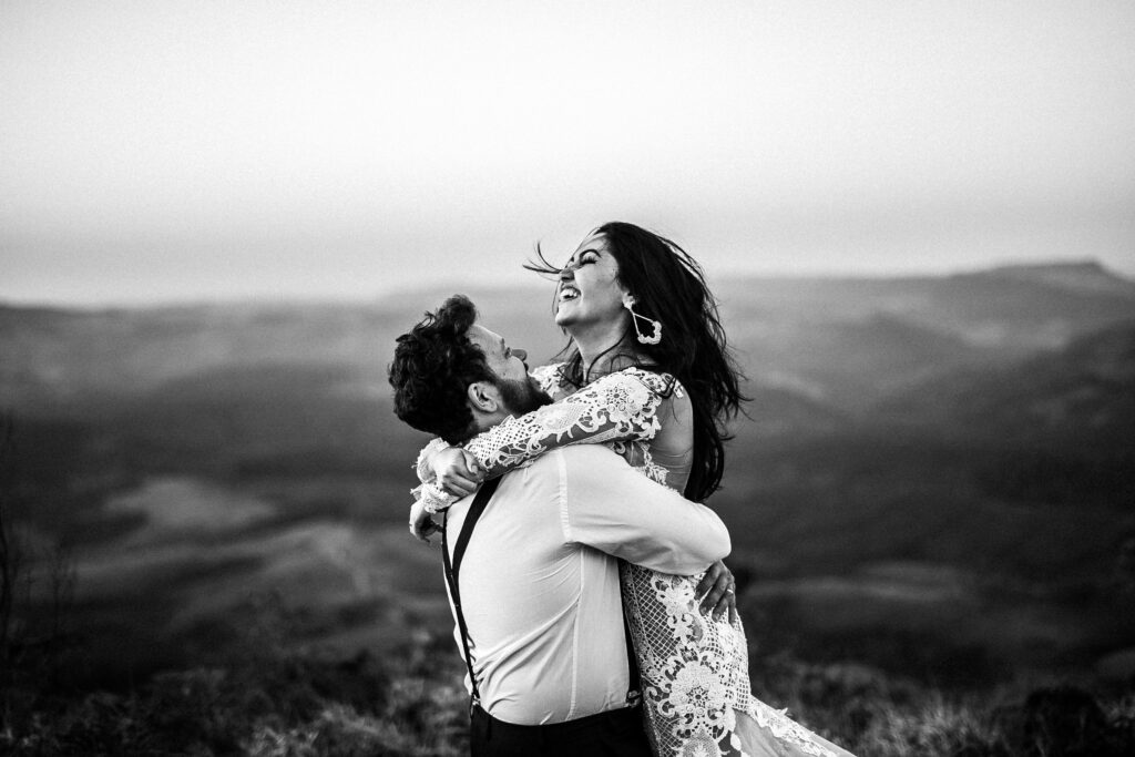 Man and woman hugging and laughing. They have their dream relationship. Photo by Everton Vila on Unsplash