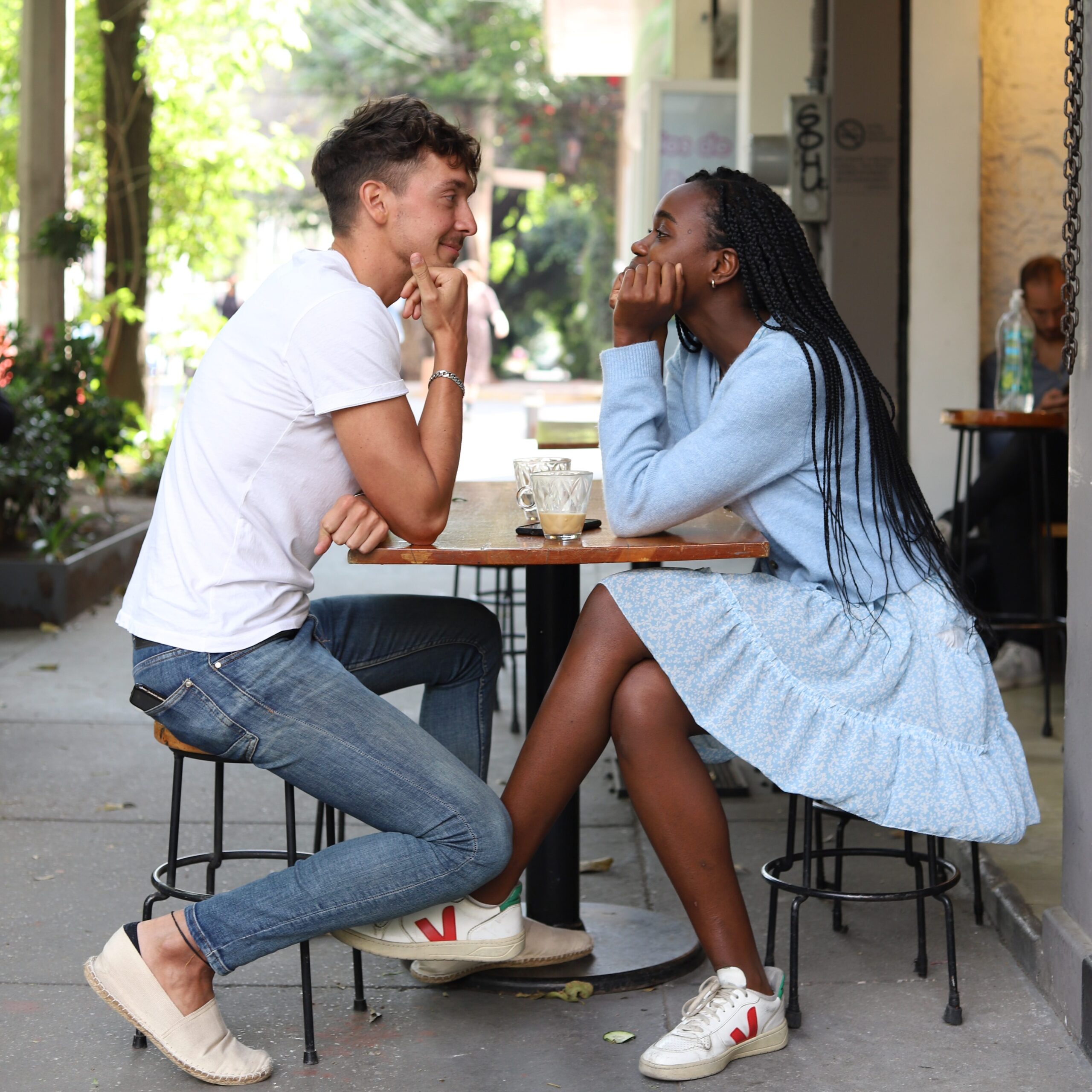 Man and woman on a coffee date. They are enjoying each other's company. Photo by Good Faces on Unsplash