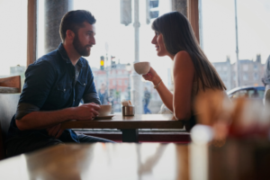 Man and woman on a coffee date.